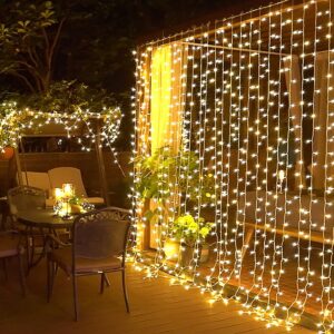JMEXSUSS 300 LED Remote Control Christmas Curtain Lights, Plug in Fairy Curtain Lights Outdoor, Window Wall Hanging String Lights for Bedroom Backdrop Wedding Party Indoor Patio...