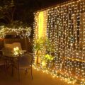 JMEXSUSS 300 LED Remote Control Christmas Curtain Lights, Plug in Fairy Curtain Lights Outdoor, Window Wall Hanging String Lights for Bedroom Backdrop Wedding Party Indoor Patio… by JMEXSUSS